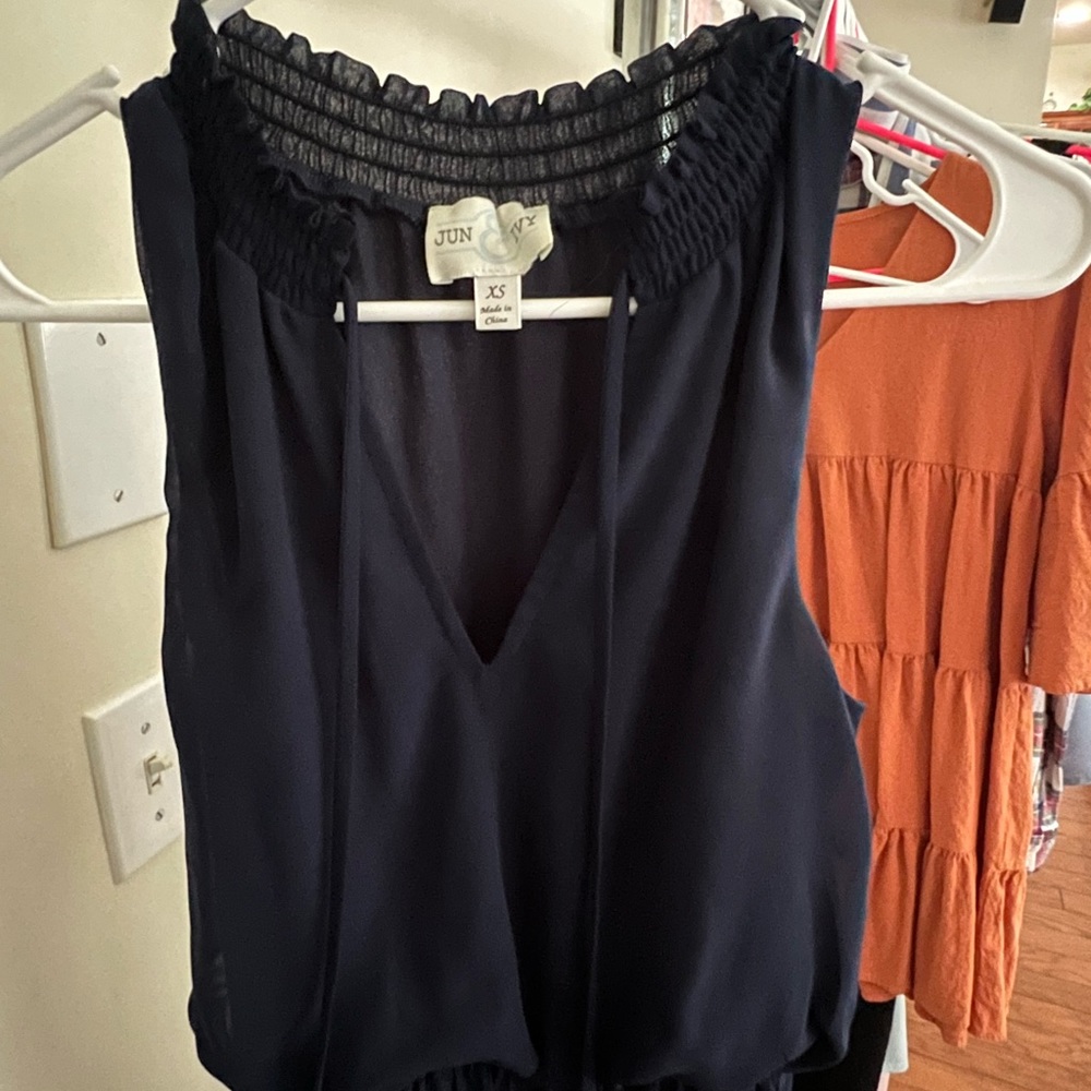 VARIETY OF DRESSES AND JUMPSUITS